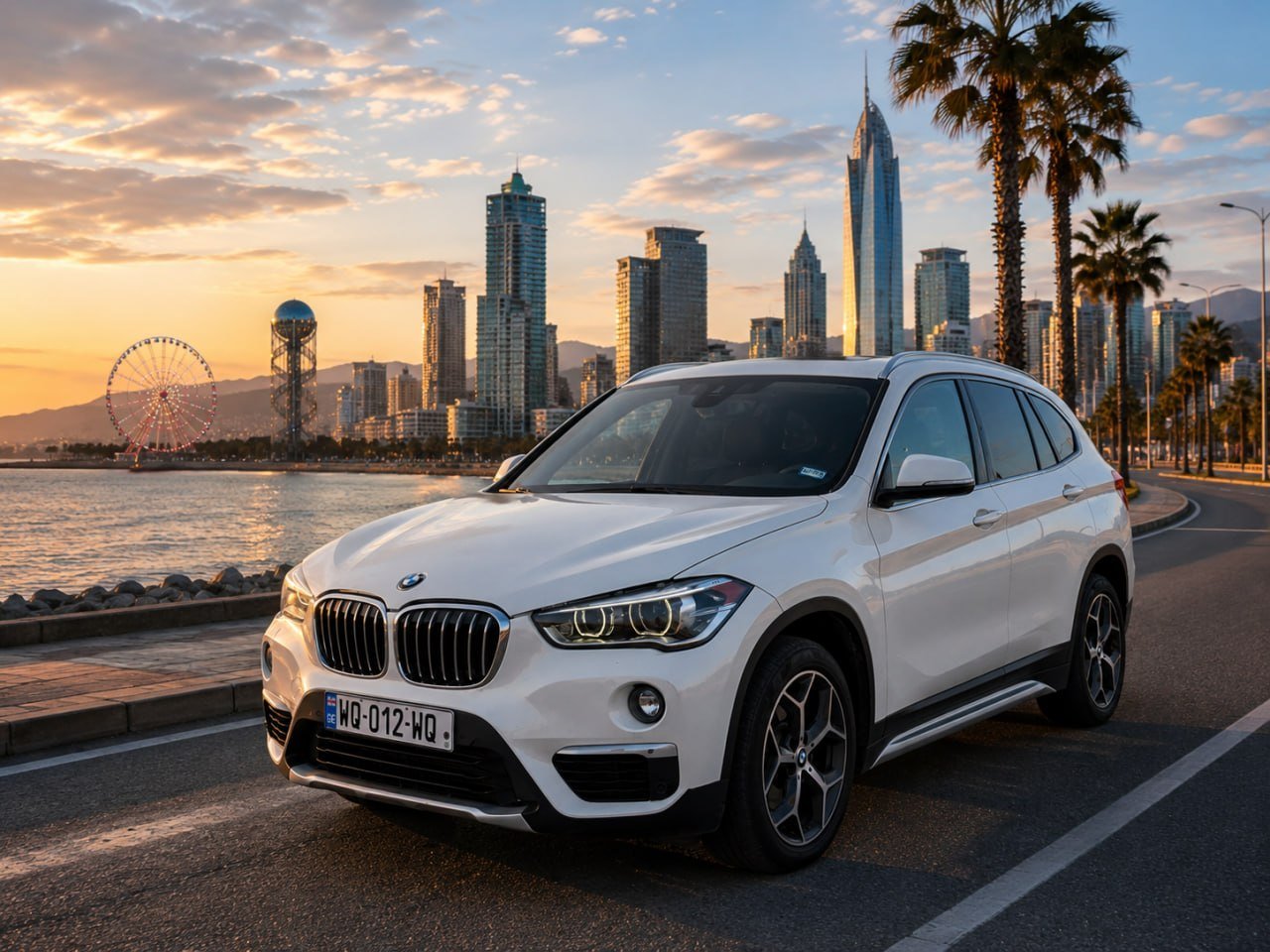 White BMW X1 rental car on the Batumi seafront with the city skyline at sunset — Lucky Rental Car
